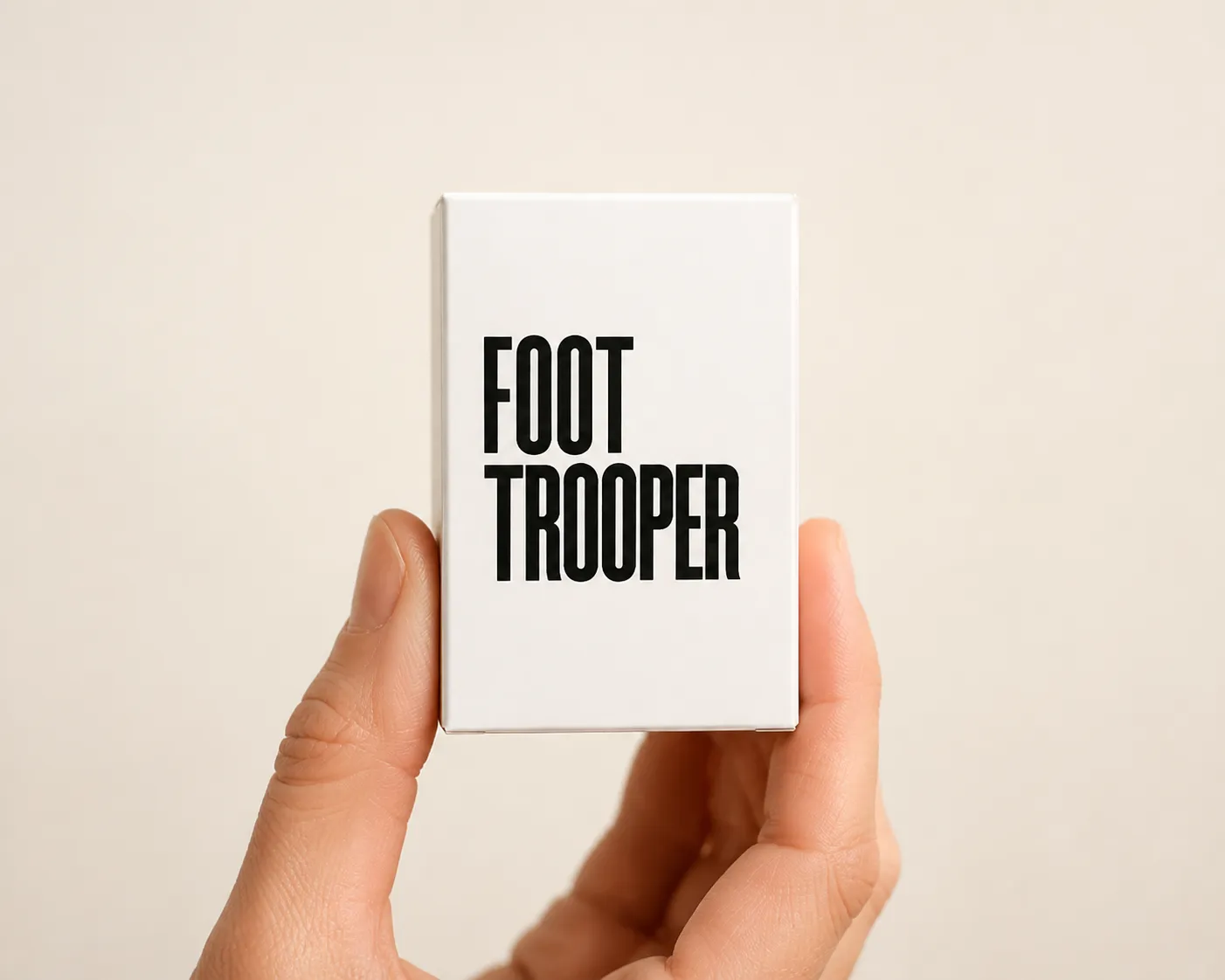 Foot Trooper — the package held in a hand