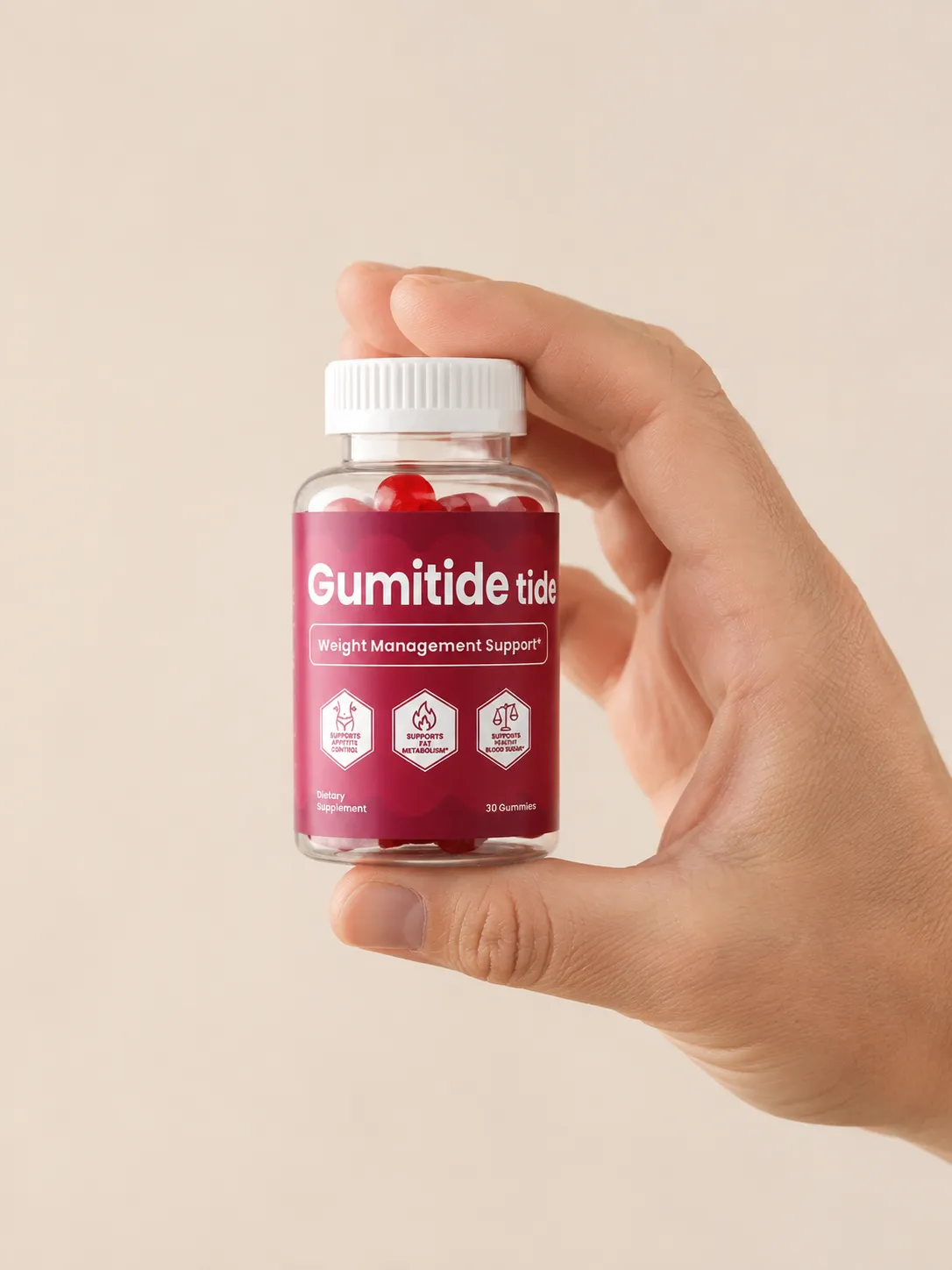 Gumitide — the package held in a hand